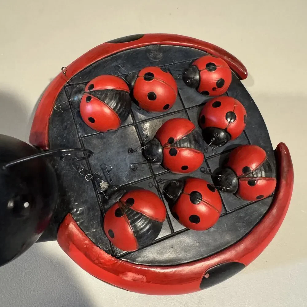 Vintage ladybug tic